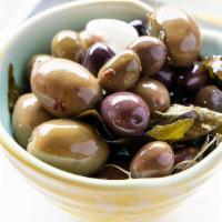 Marinated Olives · Curry leaves, fenugreek, fennel seeds, chili, garlic.