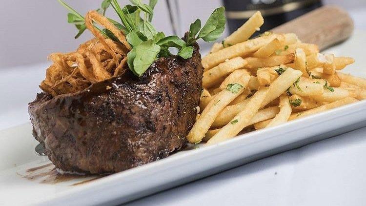 Churrasco · Grilled marinated skirt steak with chimichurri sauce. Served yucca fries.