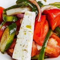 Greek · Vine-ripened tomatoes, cucumber, peppers, onions, kalamata olives and Feta.