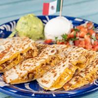 Quesadillas · Filled with melted monterey jack and cheddar cheese and your choice of meat. Served with gua...