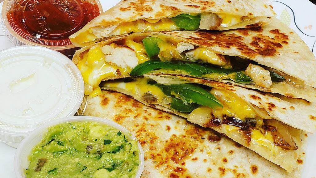 American Quesadilla · Cheddar jack cheese with grilled peppers, onions on a plain or whole wheat flour tortilla. Salsa, sour cream, and guacamole on the side.