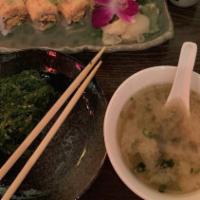 Sakura Roll · Eel, avocado, crab roll, wasabi lobster salad on top special sauce.
