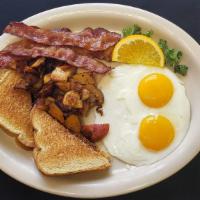 2 Eggs, Meat, Home Fries & Toast · A classic breakfast with all your favorites