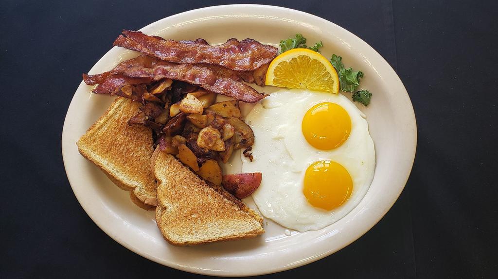 2 Eggs, Meat, Home Fries & Toast · A classic breakfast with all your favorites