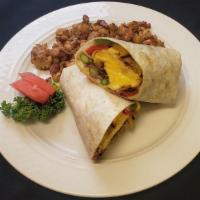 Grilled Veggie Breakfast Wrap · Grilled asparagus, red and green peppers, red onion, zucchini, yellow squash, eggs and swiss...