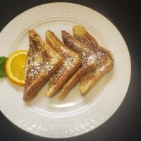 Short Stack Of French Toast · 2 slices of french toast topped with powdered sugar