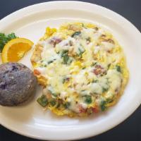 Veggie Frittata · Peppers, onions, spinach, tomatoes, potatoes and swiss cheese.