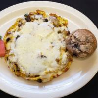 Italian Frittata · Peppers, onions, potatoes, Italian sausage and provolone cheese.