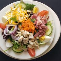 Cobb Salad · Mixed greens, diced ham and turkey, tomatos, egg, cucumbers, carrots and cheese.