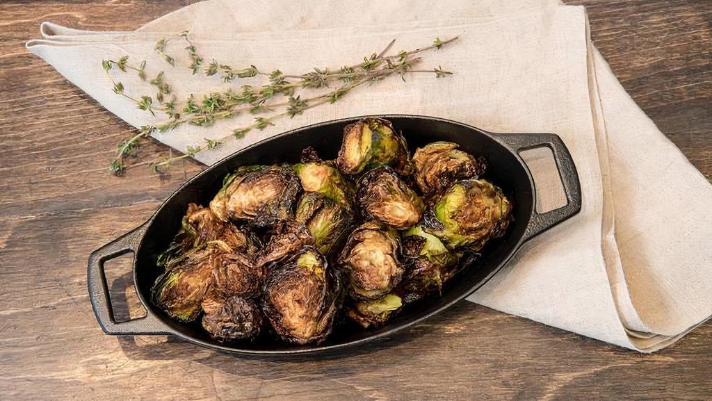 Roasted Brussel Sprouts · Brussels sprouts with scallion infused extra-virgin olive oil and maple cider vinaigrette. Vegan.