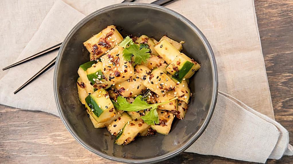 Chili Cucumbers · Cucumbers with Sichuan chili peppers, garlic chili paste, and sesame oil. Vegan and gluten-free.