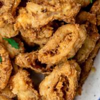 Fried Calamari  · Light and crispy fried calamari with our tomato sauce