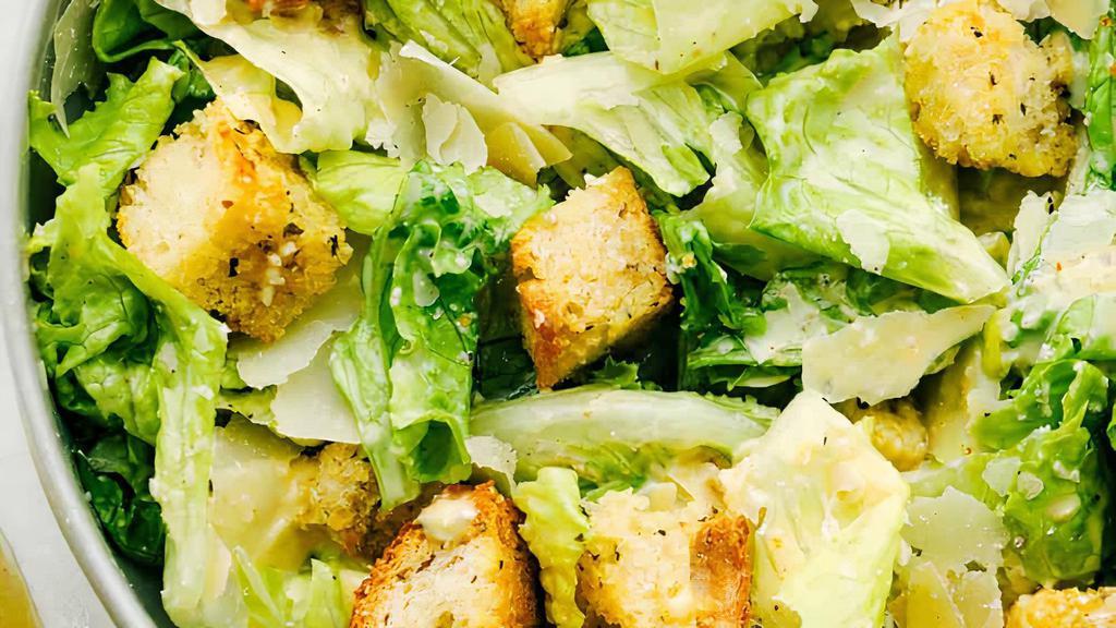 Classic Caesar Salad · Romaine lettuce, garlic croutons, parmigiano, with Caesar dressing.