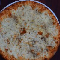 Cacio E Pepe Pizza · Mozzarella, pecorino cheese, crushed black pepper, speck and egg.