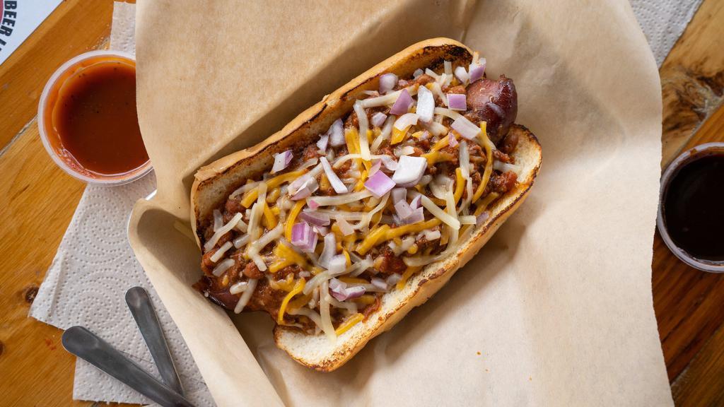 Texas Chili Dawg · 1/2lb Smoked Sausage piled with our Brisket Chili, Cheese, and Onions