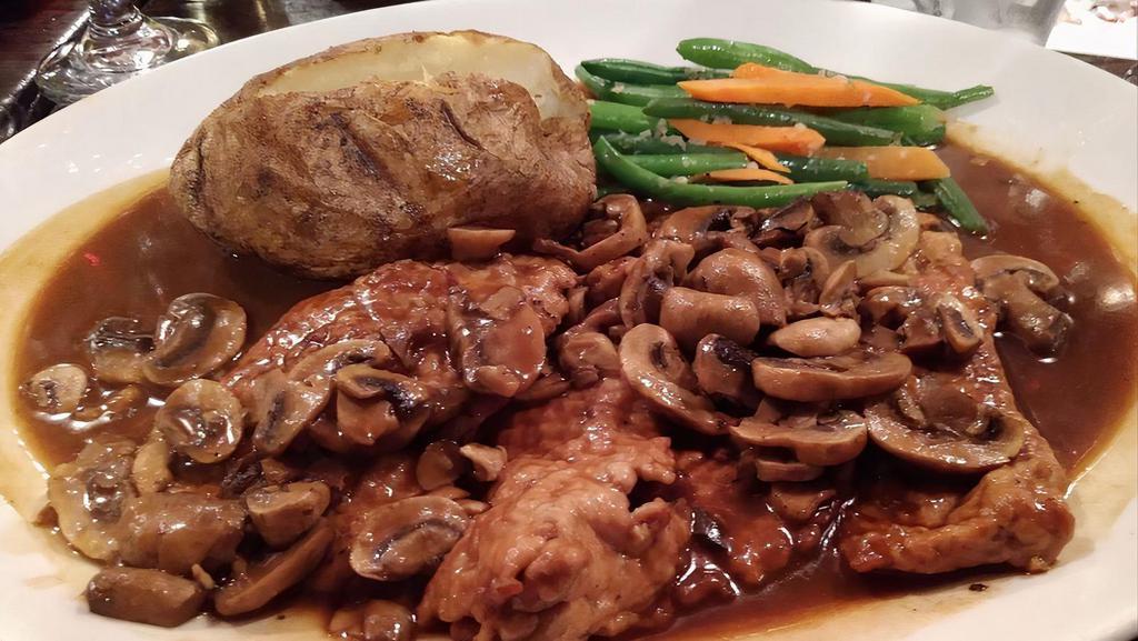 Veal Marsala · Nature veal pounded thin, sautéed with mushrooms and a rich marsala wine brown sauce.
