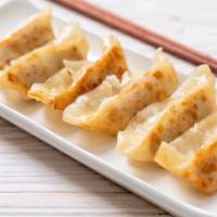 Pan Fried Dumplings 煎鸡饺子 · 7 Pcs