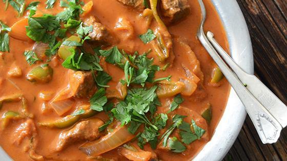 Lamb Tikka Masala · grilled and cooked in rich creamy sauce.