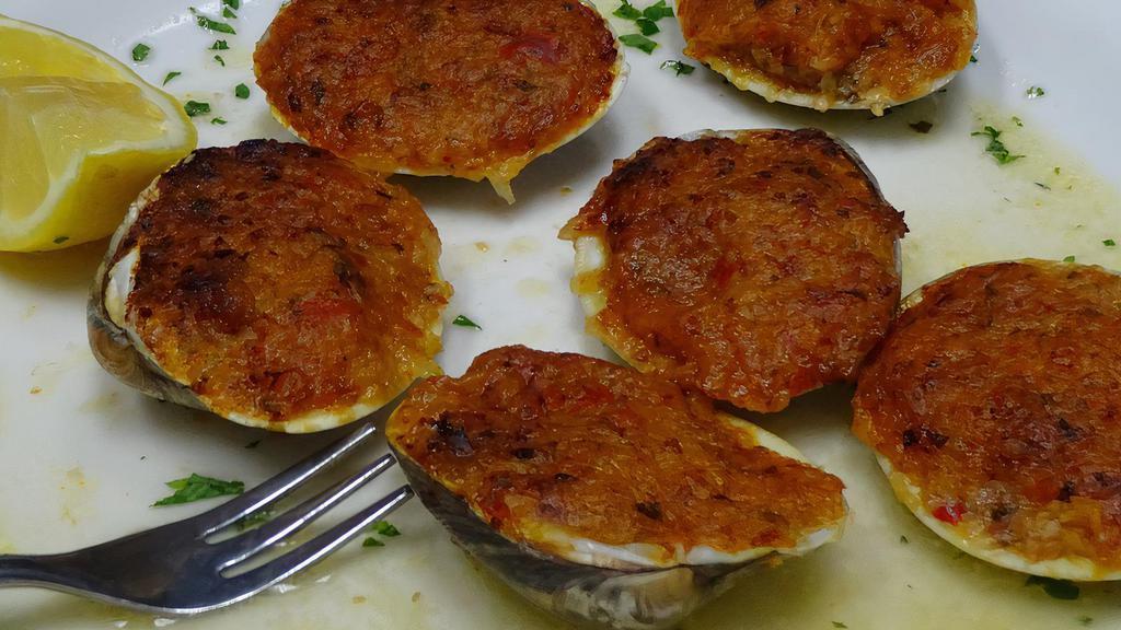 Clams Casino · Littleneck clams stuffed with bacon, peppers and onions.