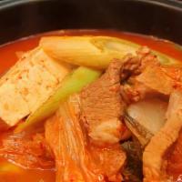 Kimchi Stew / 김치찌개 · Spicy. Spicy stew made with ripened kimchi, pork & tofu.