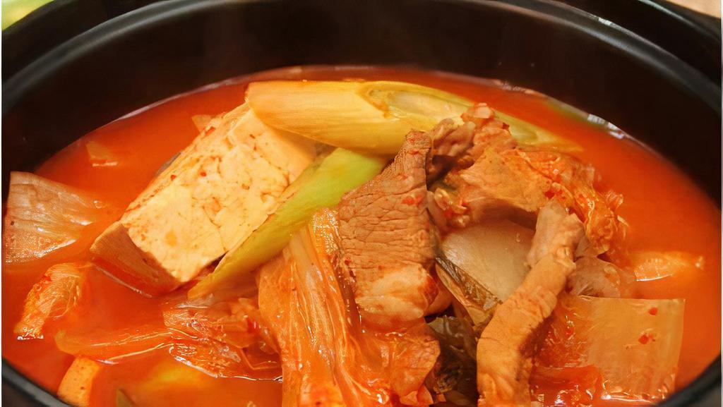 Kimchi Stew / 김치찌개 · Spicy. Spicy stew made with ripened kimchi, pork & tofu.