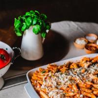 Penne Alla Vodka · House sauce of blended vodka, heavy cream, crushed tomatoes, onions.