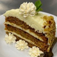 Carrot Cake · Our all-natural carrot cake featuring real cream cheese, sliced walnuts and golden raisins.