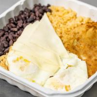 Milanesa Del Chef · With eggs, cheese, rice and beans. / Con huevos, queso arroz and frijoles.