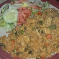 Arroz Con Pollo · Chicken vegetables rice w/side salad or fries
