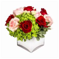 Young Love By Bloomnation™ · This arrangement includes blush pink roses, red roses, blush spray roses, white hydrangea. Y...