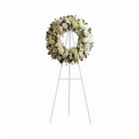 T239-3A Serenity Wreath · A ring of fragrant, bright white blossoms will create a serene display at any funeral or wak...