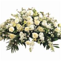 Tf194-1 Pure White Casket Spray · This casket spray with its array of white carnations, larkspur, asters and stock adds a pure...