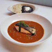 Pescado Del Dia · Call to the restaurant for the fish of the day. Pipian rojo, white rice, refried beans, tort...