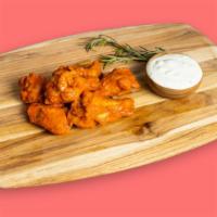 Just Your Buffalo · Our famous wings fried until perfectly golden and tossed in mild or hot buffalo sauce. Serve...