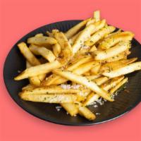 French Fries · Crispy potatoes fried until golden- garnished with sea salt and spices.