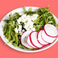 The Summer Salad · Fresh arugula, red onions, crunchy cucumbers and olives served with house made dressing