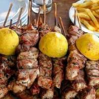 Pork Souvlaki Stick/Pita · Marinated cubed meat grilled on a bamboo skewer. Served with pita bread.