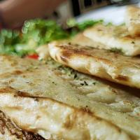 Greek Pita Bread · Warm pita bread.