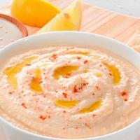 8 Oz. Hummus With Pita Bread · Try our hummus made from chickpeas, olive oil, tahini, lemon, and garlic. Served with one pi...