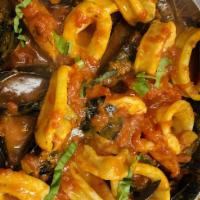 Frutti Di Mare · A combination of shrimp clams, calamari and mussels in a garlic cream sauce.