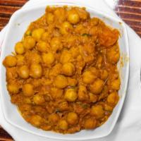 Chana Masala · Chickpeas cooked with ginger, garlic, tomato & onion spices Punjabi style.