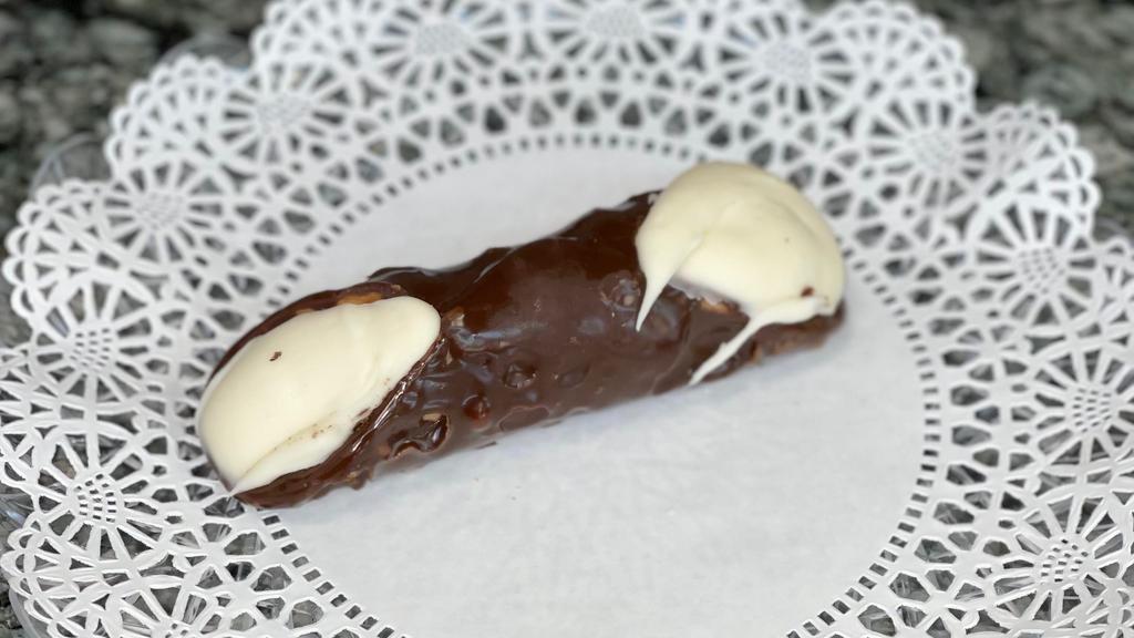 Chocolate Cannoli Large · Chocolate dipped cannoli shell filled with our famous cannoli cream.