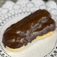 Eclair · Puffed dough with vanilla custard, top dipped in chocolate.