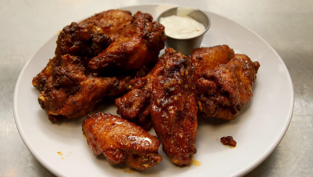 Wings – Full Plate · 10 jumbo bone-in with choice of garlic parmesan, Buffalo (hot, medium, mild) 3 wise men (Johnnie Walker, Jim Beam & Jack Daniels) raspberry chipotle, country sweet or honey Cajun sauce. Select either 1 or 2 sauces with the full order of wings.