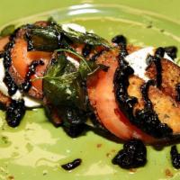 Crispy Eggplant · Vegetarian. roma tomato/fresh mozzarella/fried basil balsamic glaze/first press olive oil.