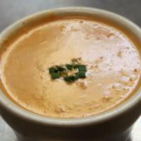 Lobster Bisque · A cup of tender Maine lobster in a rich, creamy tomato broth, cup.  Make it a bowl for a sma...