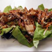 Trio Of Chicken Lettuce Wraps · Asian slaw/gochujang sauce/walnuts/avocado pickled red onions/sesame seeds.