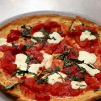 Margherita Flatbread · crushed tomato/fresh mozzarella/basil/ olive oil. Add cauliflower crust on request for an ad...