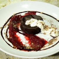 Chocolate Torte · Deep rich tasting/flourless whipped cream/chocolate shavings.