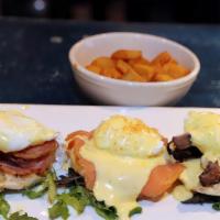 The Trio Of Eggs Benedict · 3 English muffins topped with poached eggs/hollandaise sauce/1 each with Italian pancetta/sm...